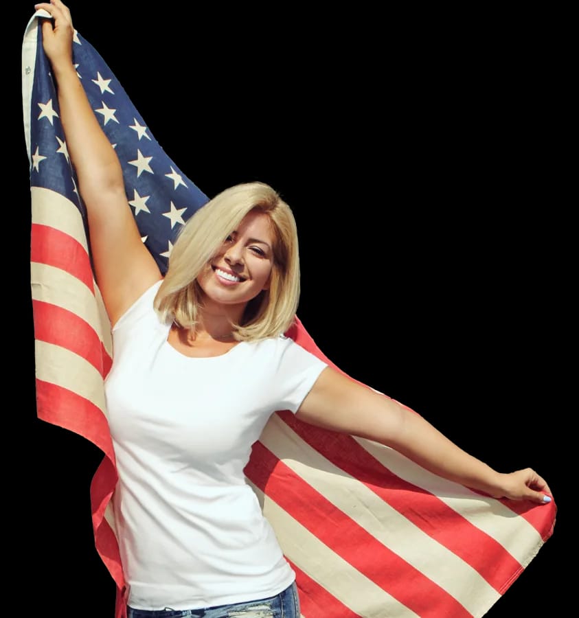 Student celebrating with an American flag
